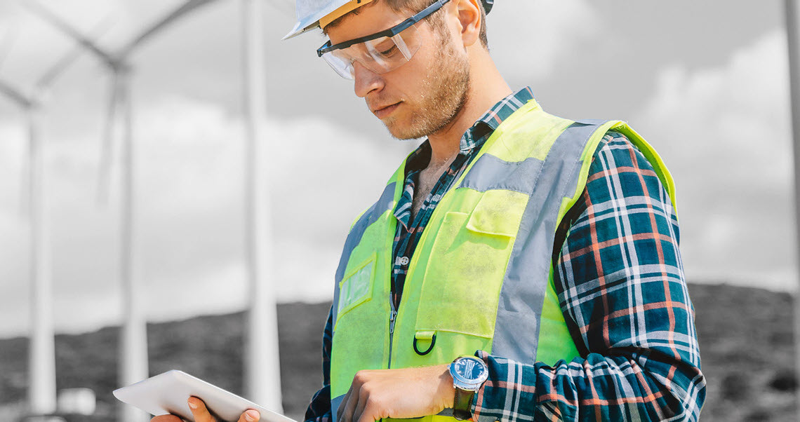 image of a male and female construction project  manager on site